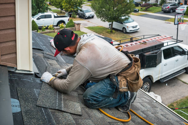 Professional Storm Damage Roof Repair technician working in Union City, MI